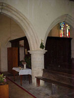Photograph showing a low arch by the vestry.